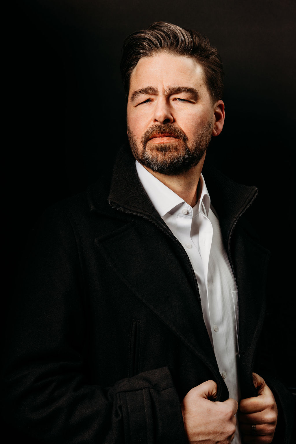 Joe Hungerman Standing with Coat