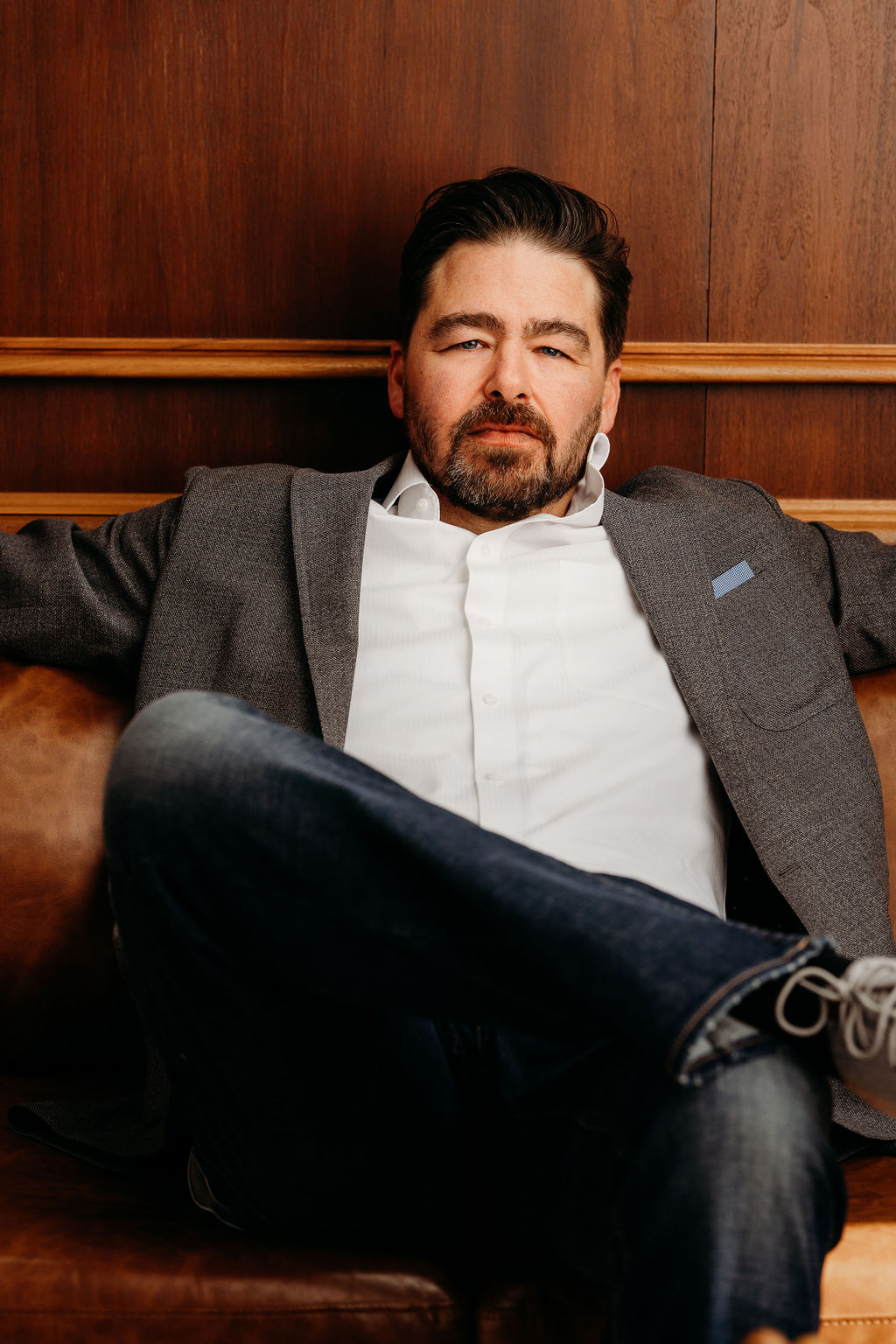 Joe Hungerman Sitting Relaxed on Couch