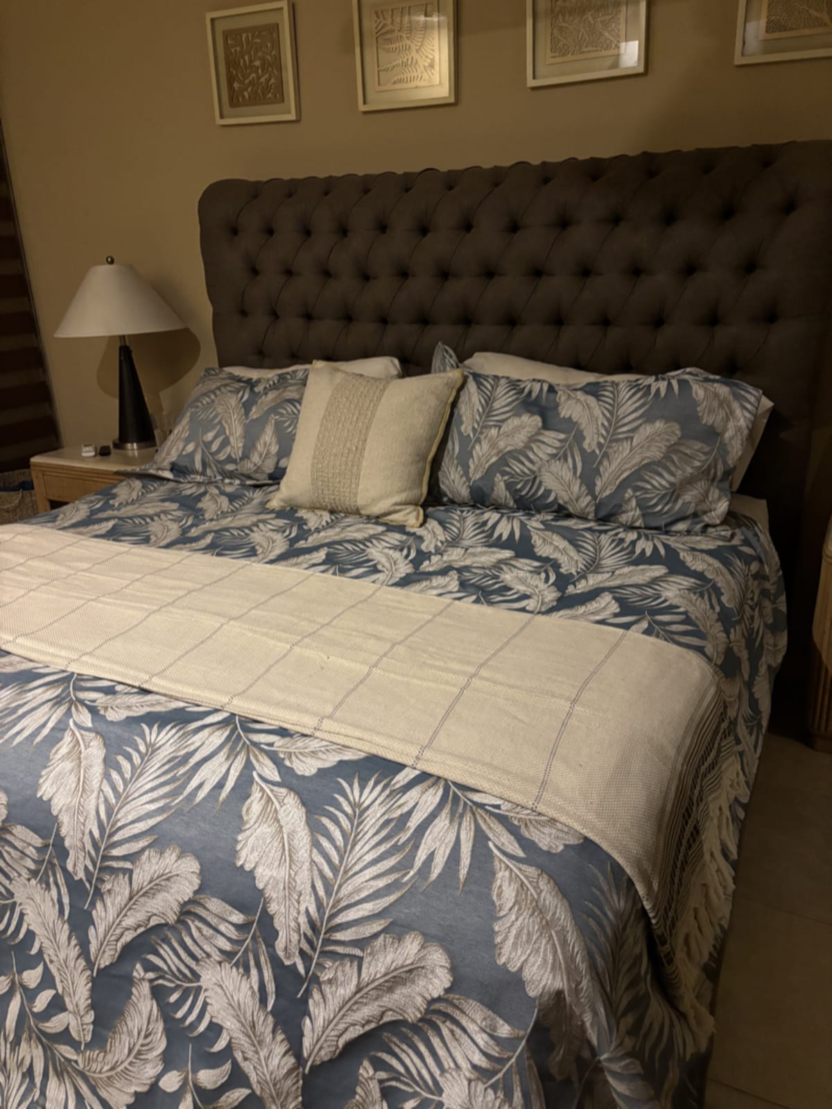 Cozy bedroom setup with eye mask and earplugs on nightstand for better sleep