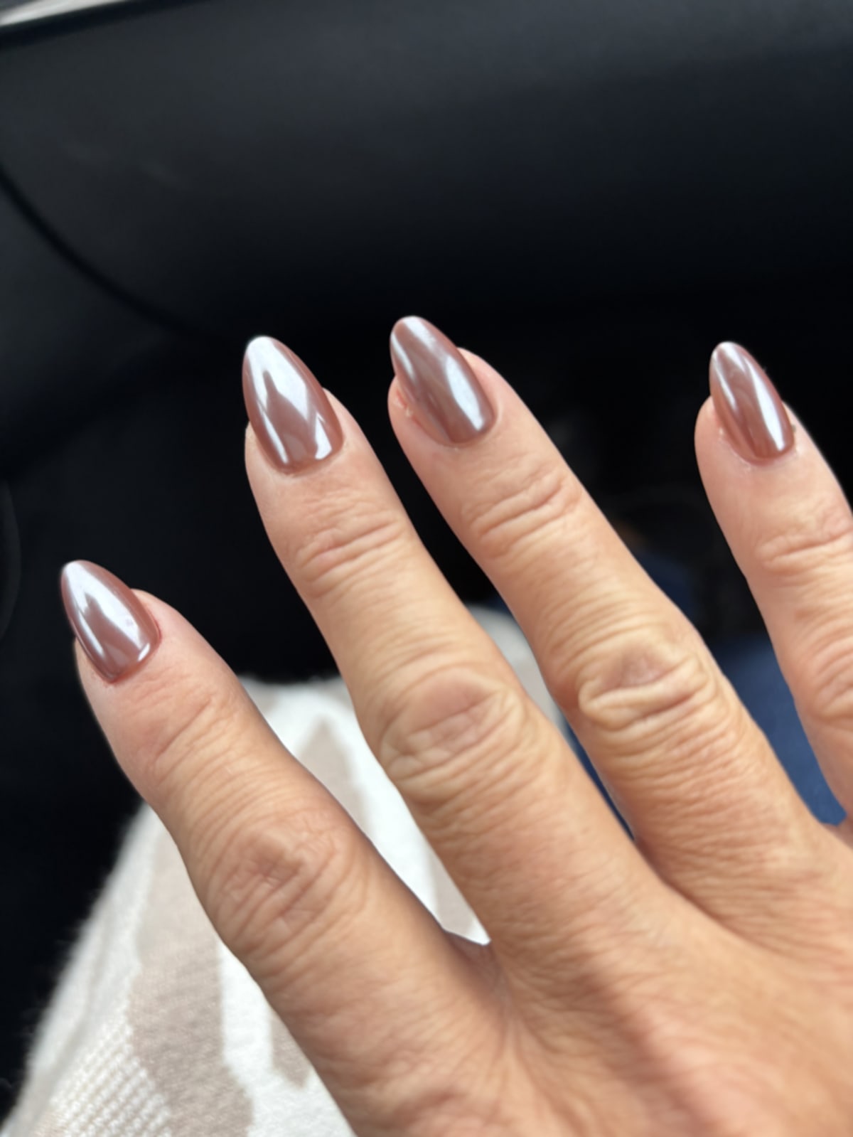 Beautifully painted fingernails showing the results of self-care
