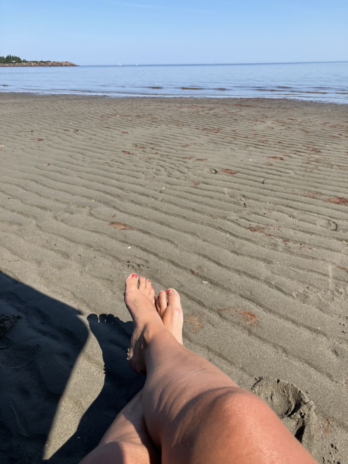 Taking time for myself at the beach to reflect, read, and get some vitamin D with my favorite beach essentials.