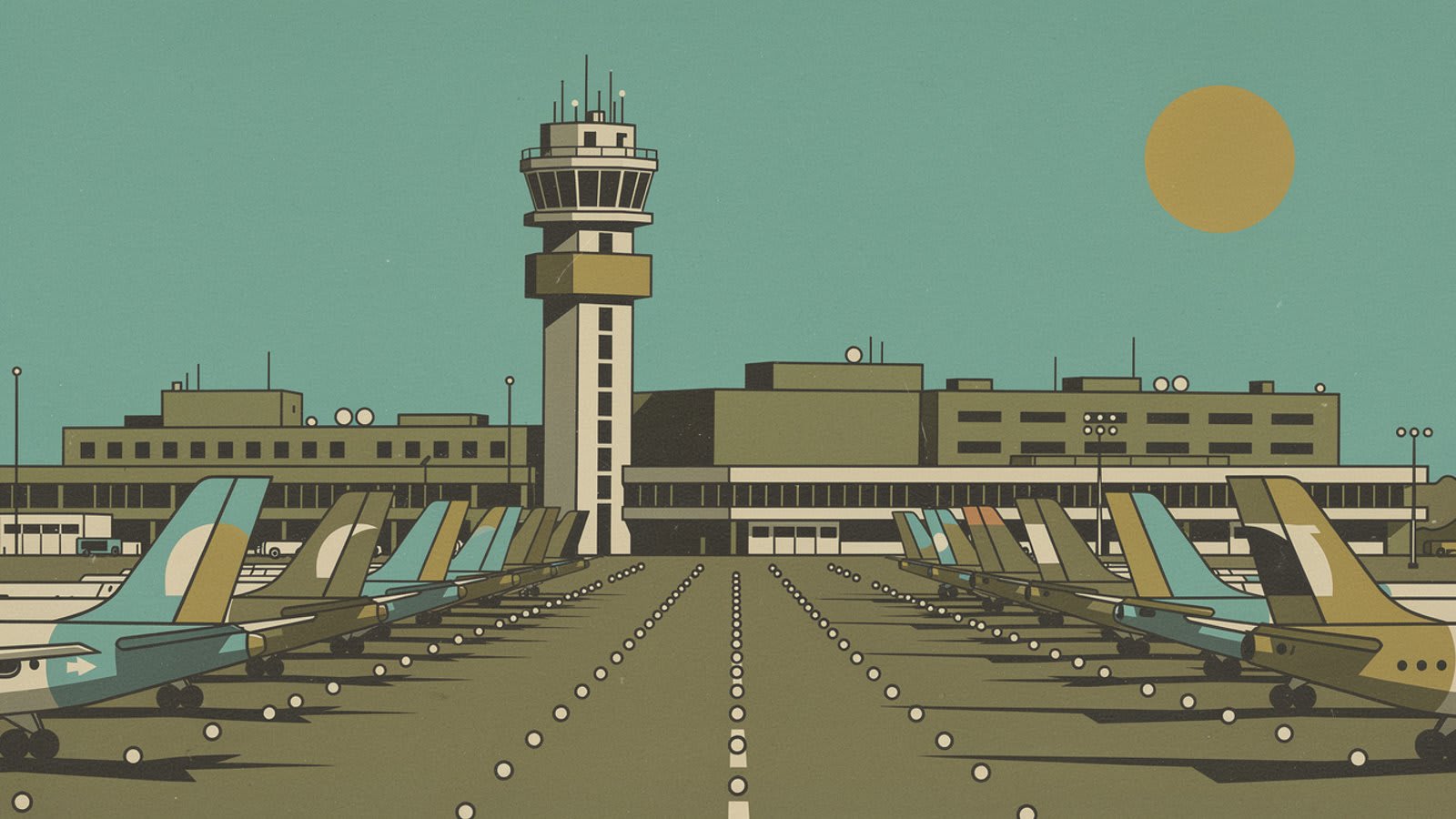 Tour de contrôle et aire de trafic d'un aéroport commercial au lever du jour