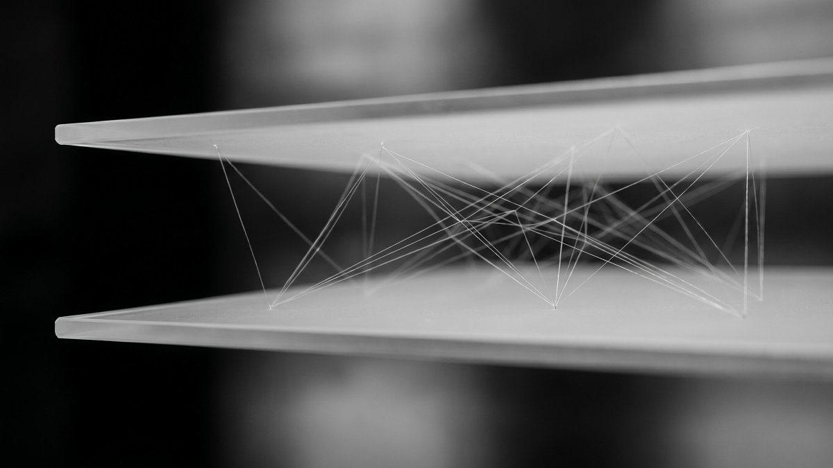 Two stacked translucent blockchain settlement layers with fast transaction flows between them