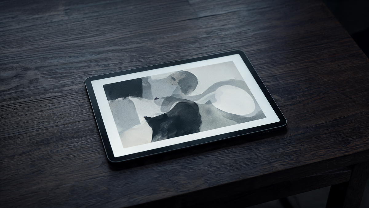 A tablet showing an online auction viewing of a contemporary artwork