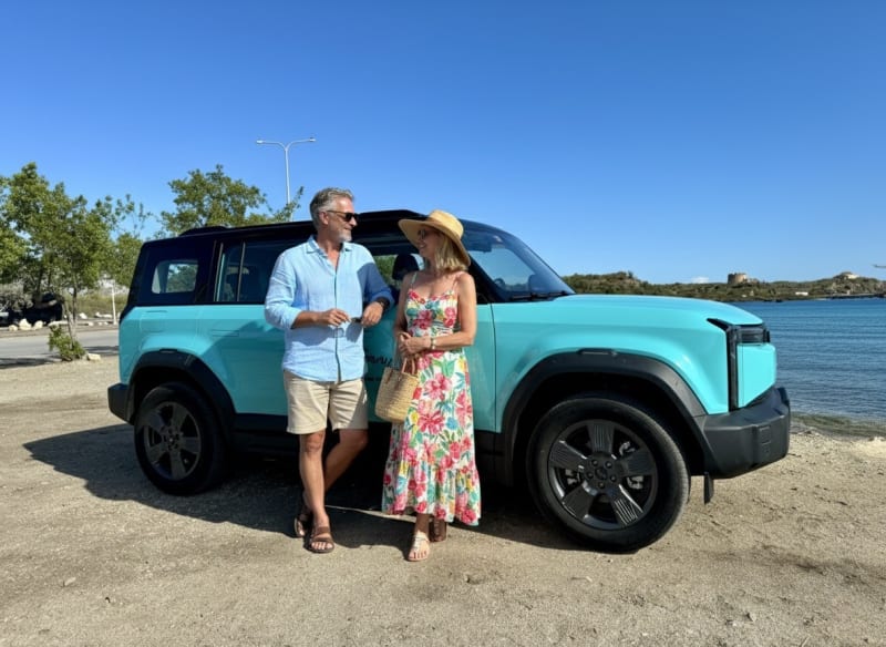 Turquoise-accent EV-SUV charging at the villa