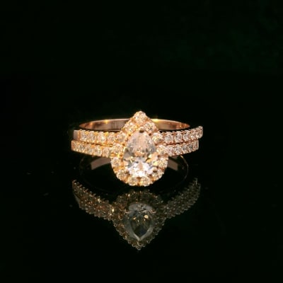A customized wedding set in 18K Rose gold.  image