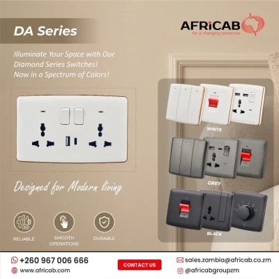 Sockets and switches in black and white with a touch of gold image