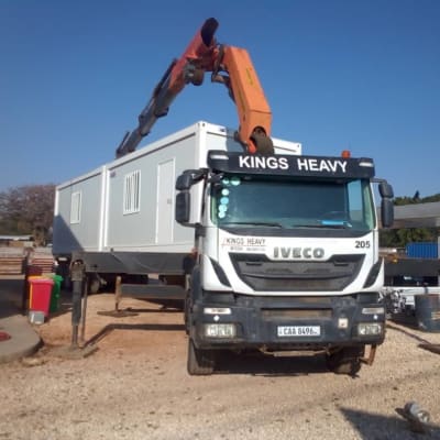 Transport and relocation of heavy construction equipment image