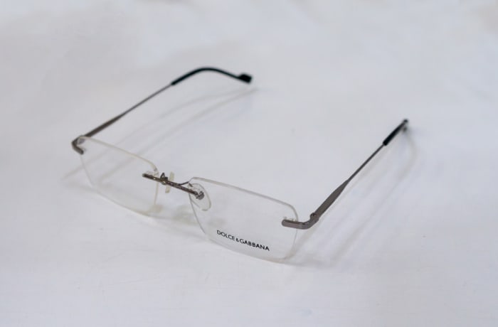 Grey Rimless Eyeglass Frames | Vision Care Opticians