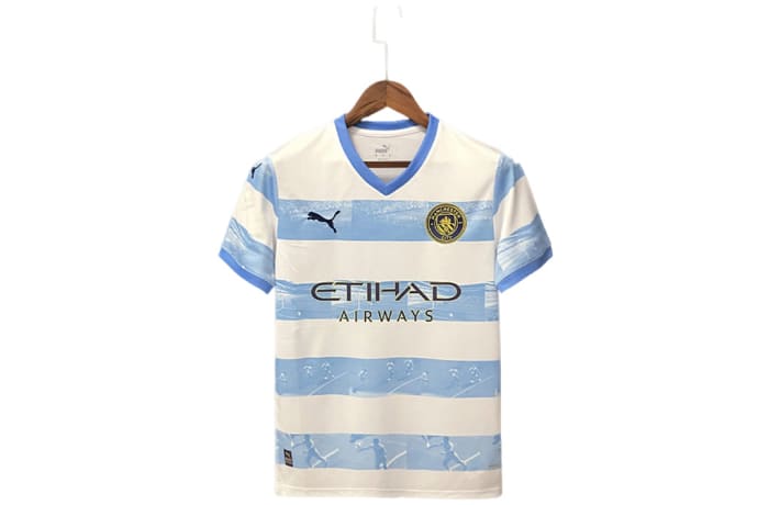 Man city commemorative shirt on sale