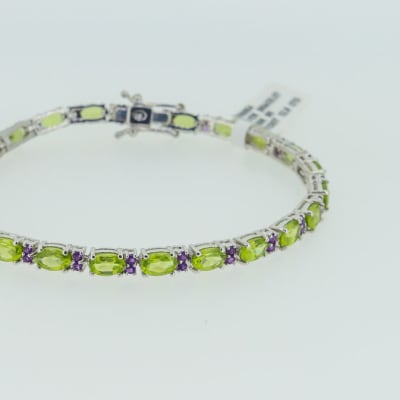 Silver linked chain peridot and amethyst bracelet image