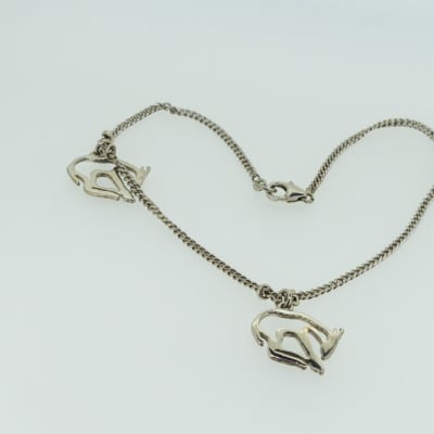 Silver necklace with donkeys image