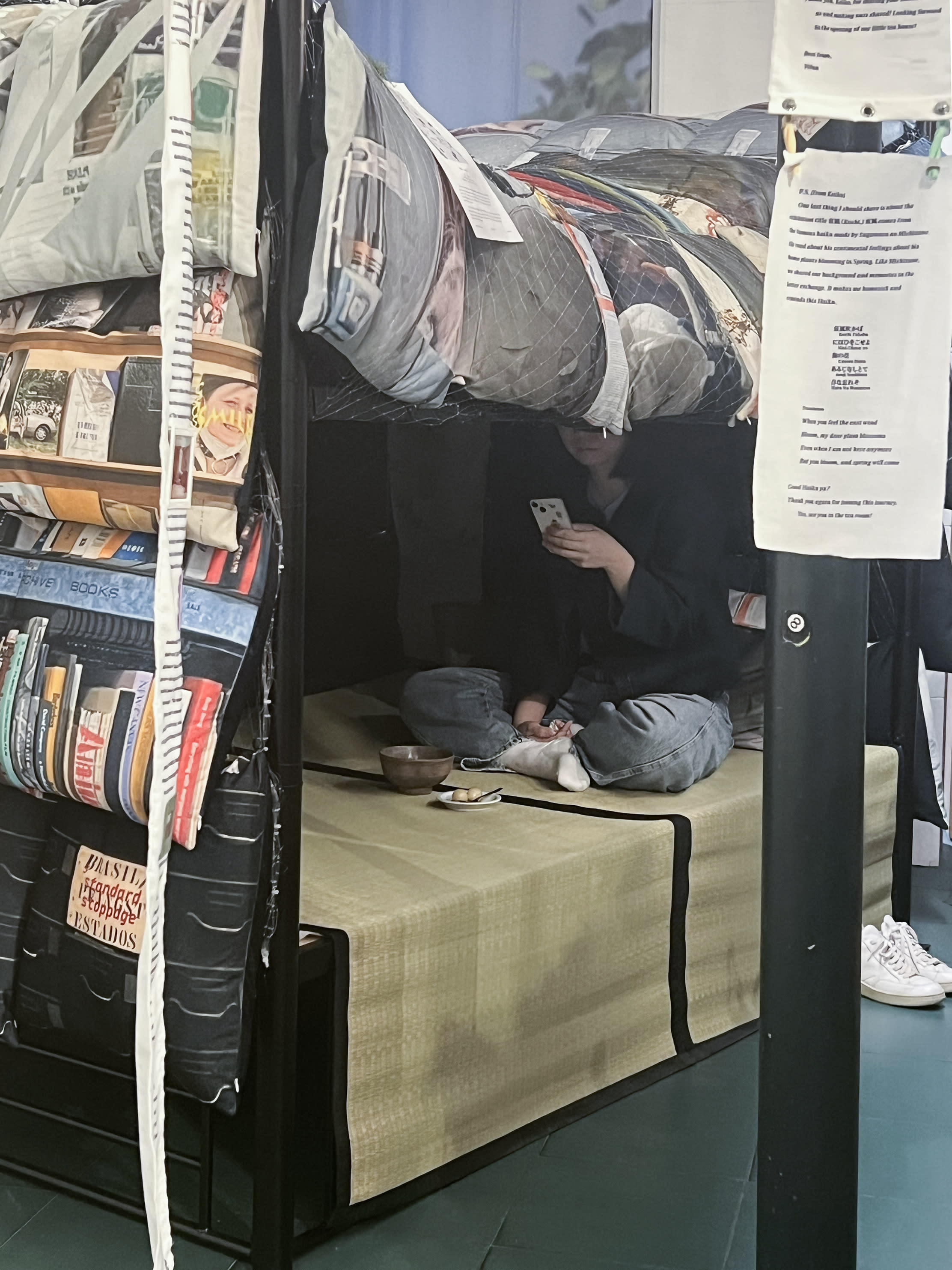 Visitor reading Kochidoko hanging material