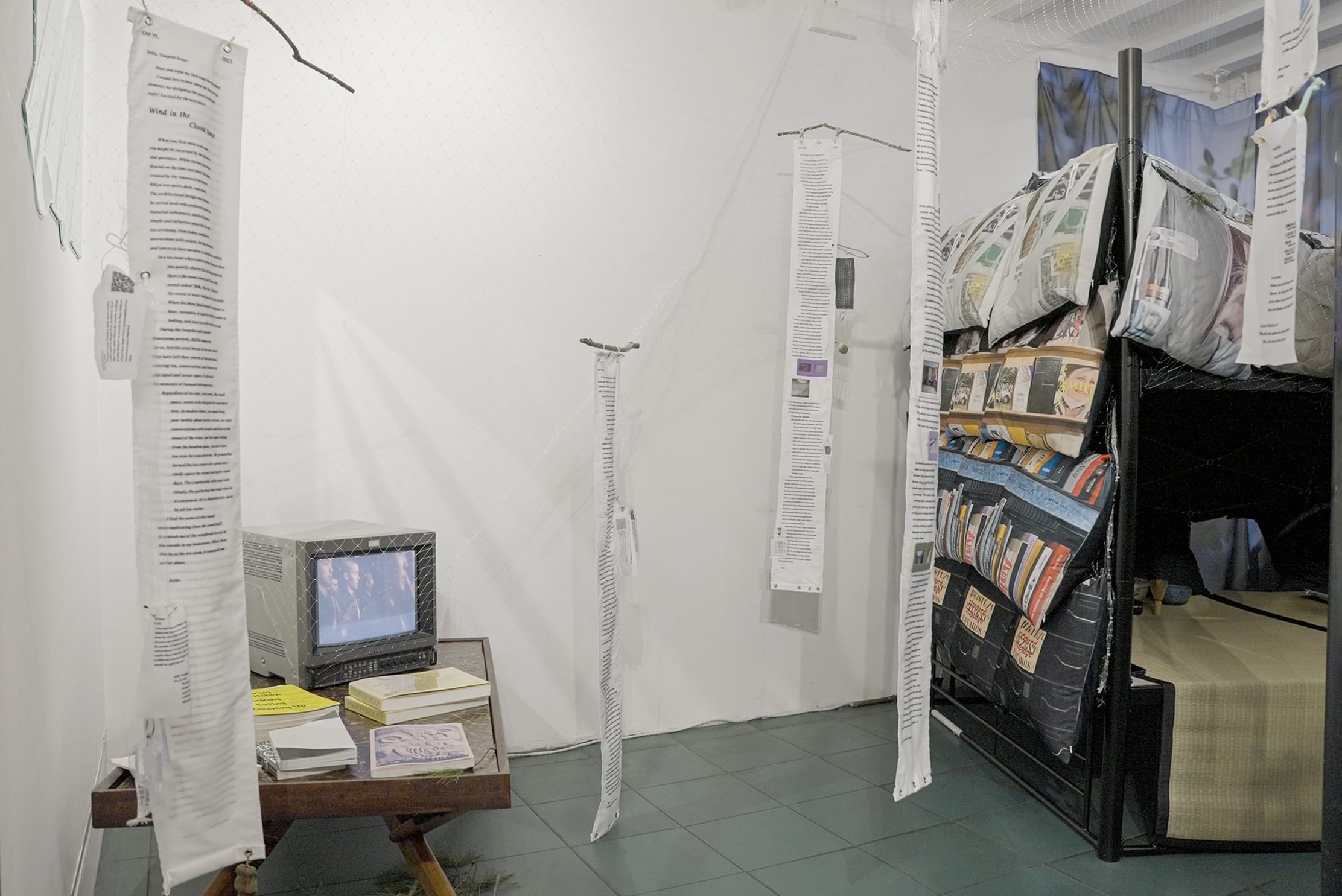 Kochidoko installation with suspended paper and bunk bed