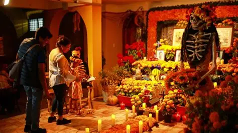 Altar con flores de cempasúchil y calaveras de azúcar.