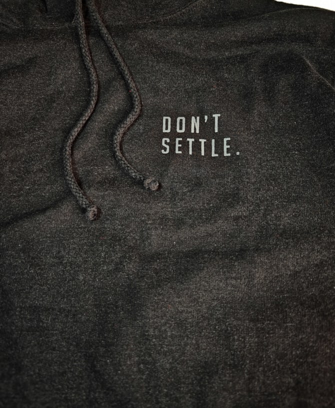 Don't Settle Hoodie — (Heather Black)