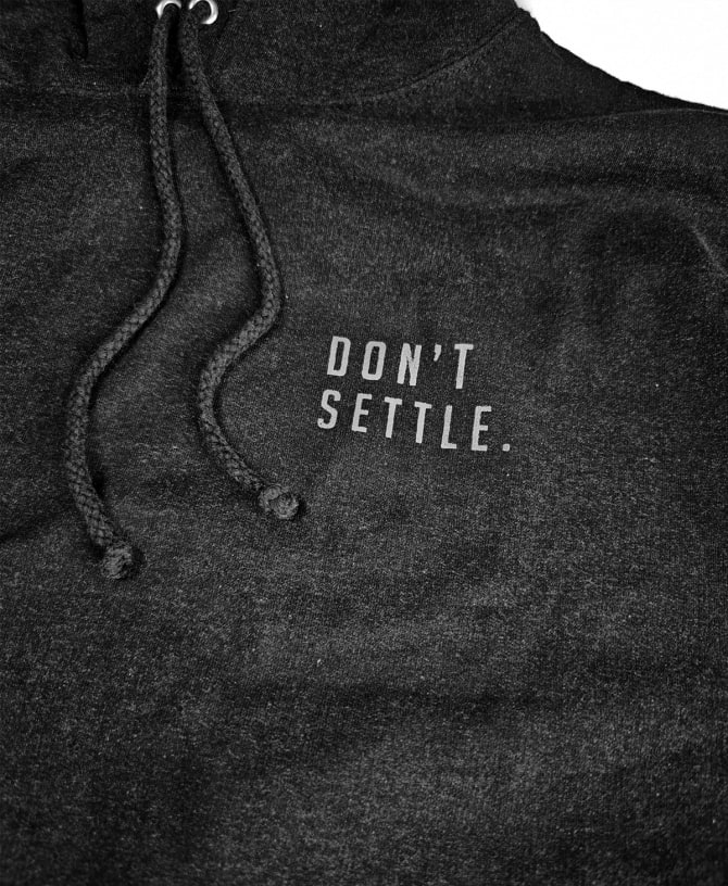 Don't Settle Hoodie — (Heather Black)