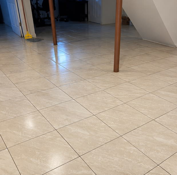 The same basement tile floor clean again after Restorehaus sewage cleanup