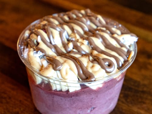 Acai bowl topped and drizzled