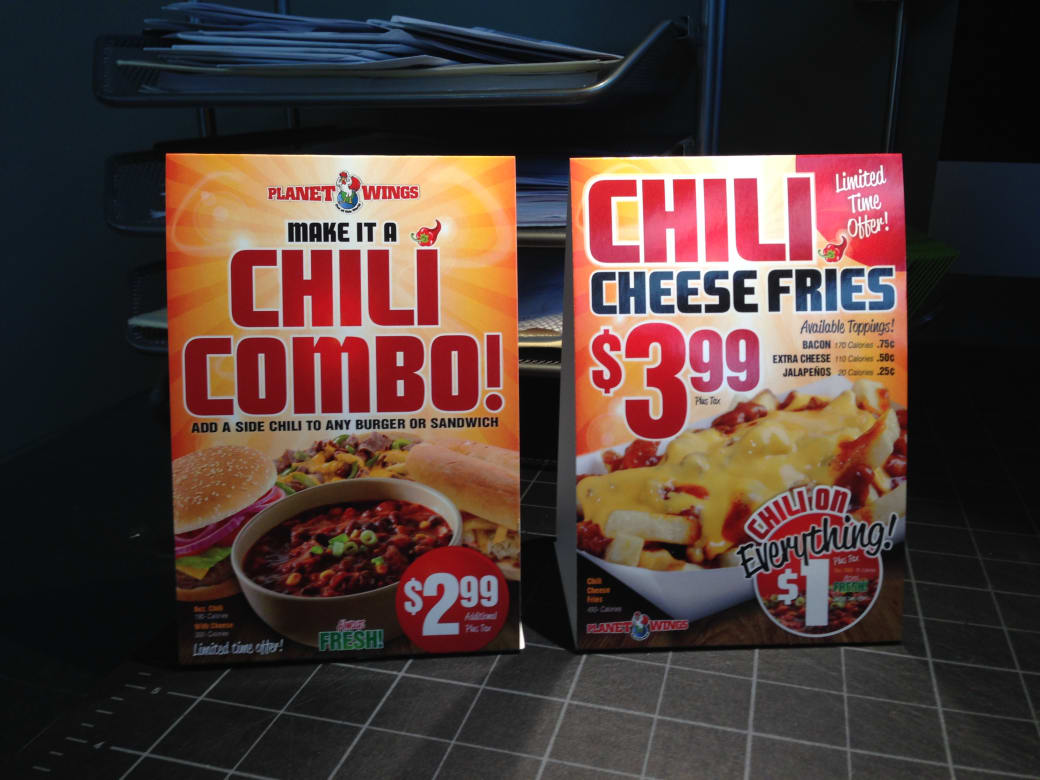 Planet Wings restaurant branding and signage