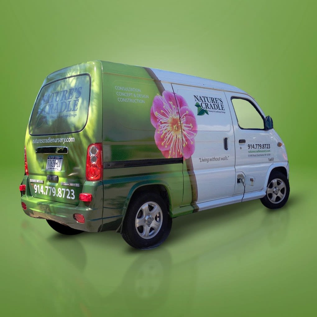 Nature's Select van wrap with floral graphics