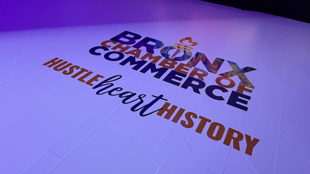 Close-up of the Bronx Chamber of Commerce dance-floor decal reading Hustle Heart History