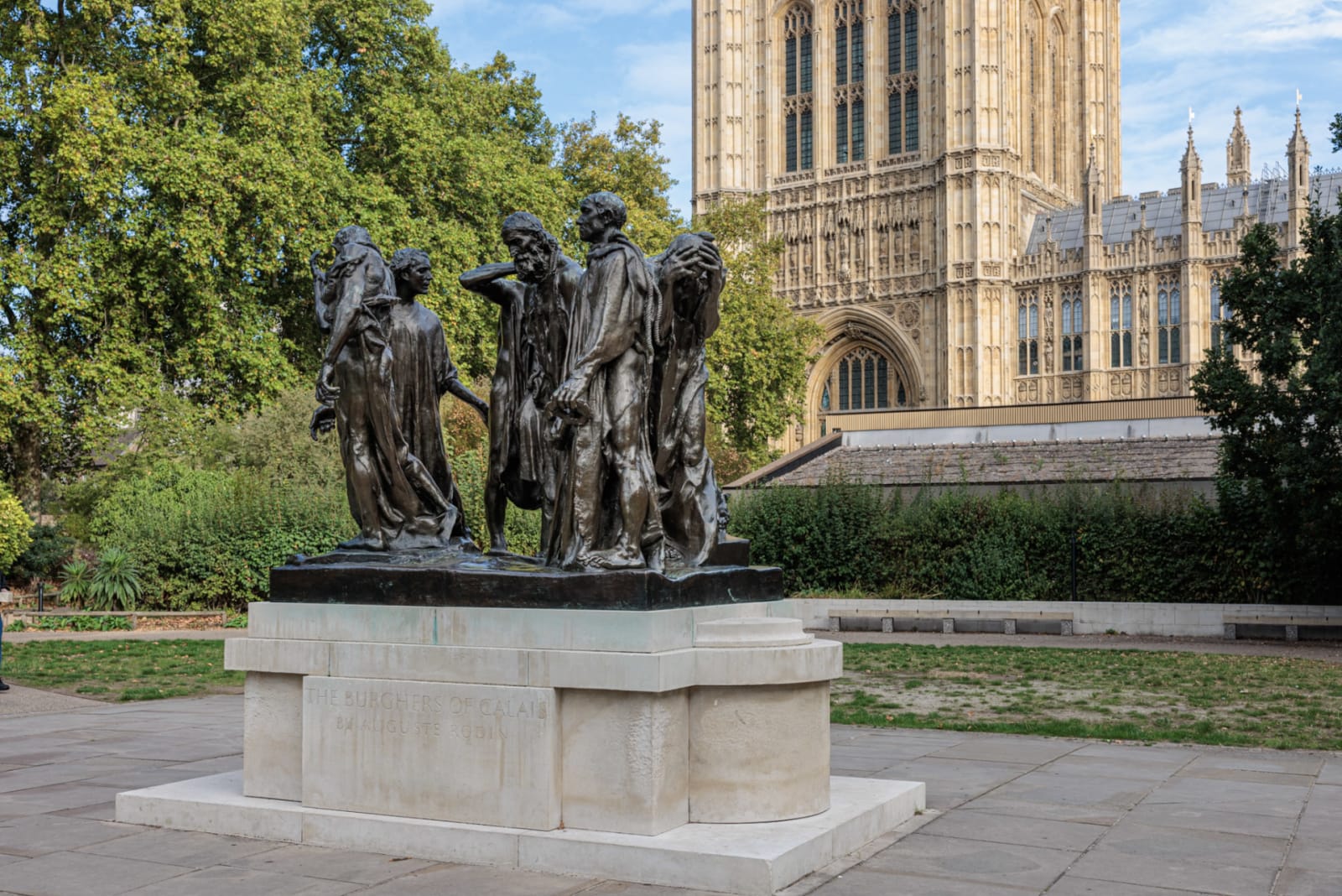 Figures Against the Victoria Tower