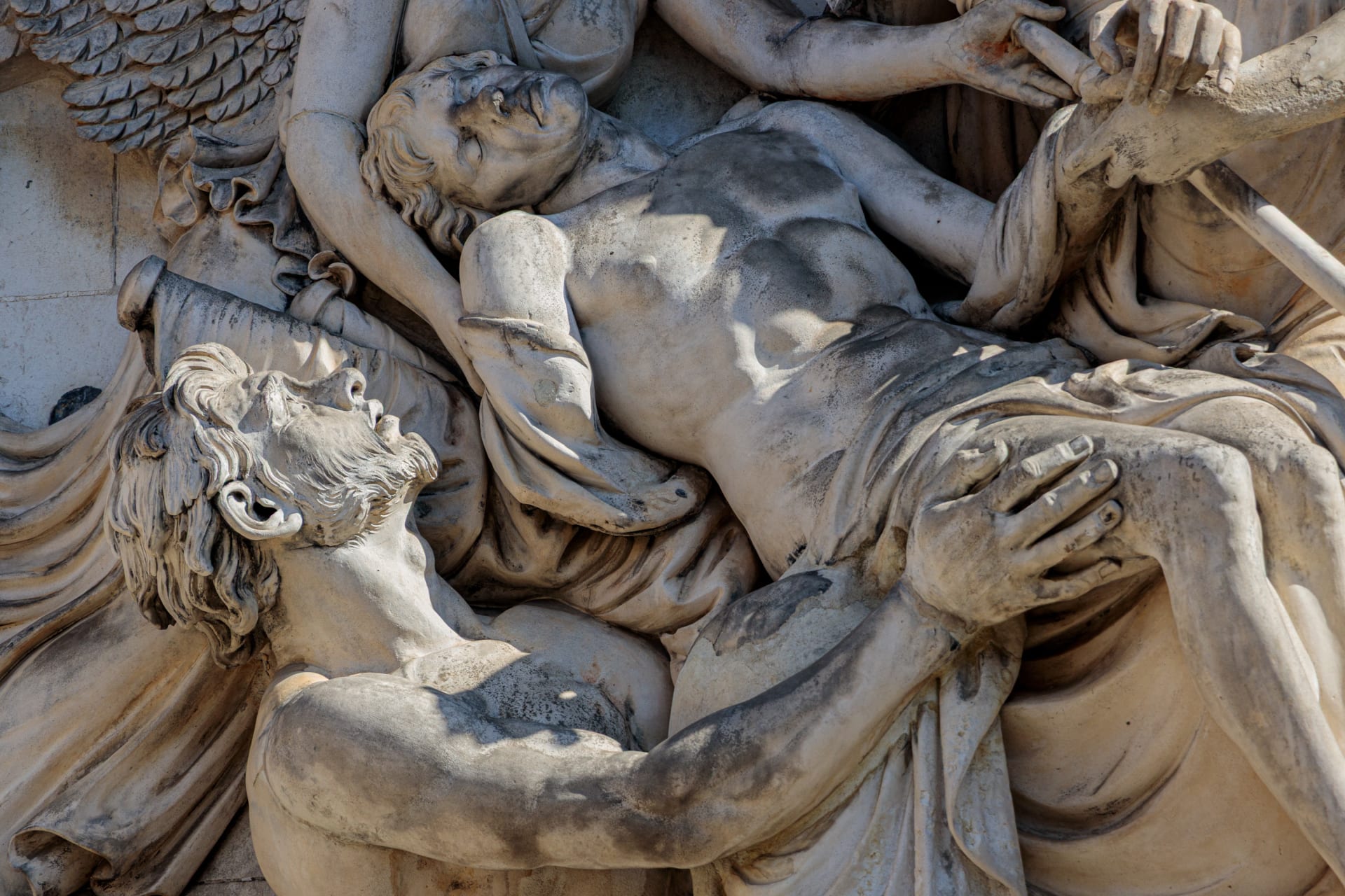 A detailed close-up of the stone relief sculpture 'The Immortality of Nelson' located on the King William Building at the Old Royal Naval College in Greenwich.