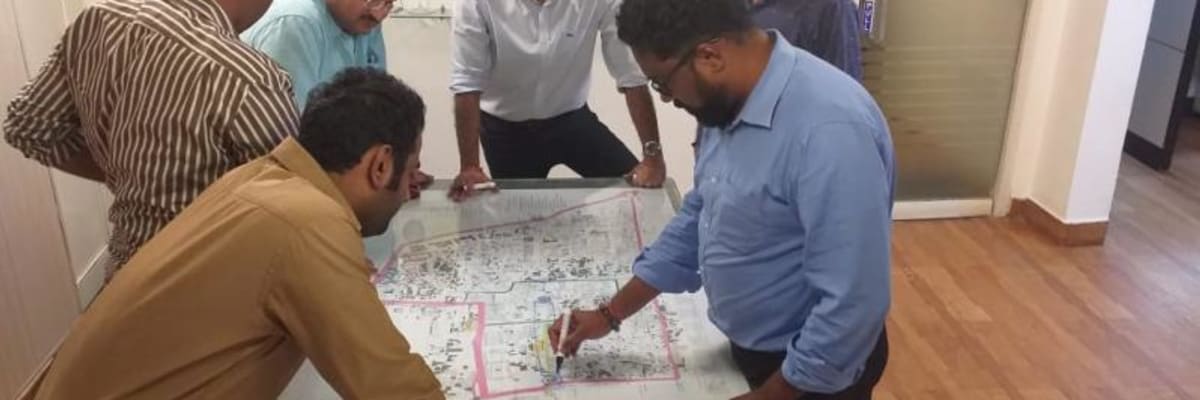 LooCafe team coordinating with government officials