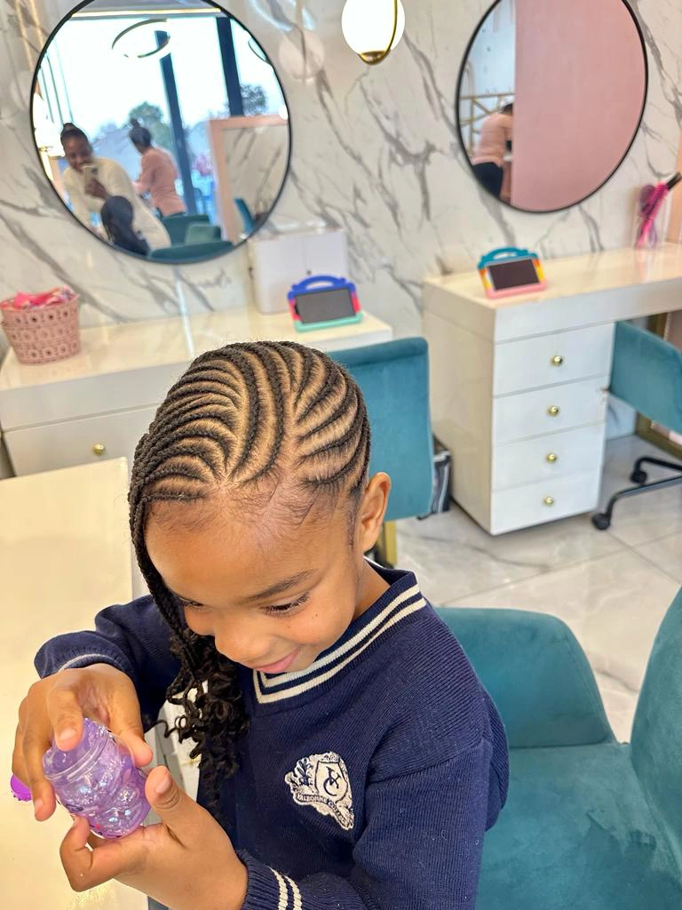  Young girl enjoying a pampering session at POSH ANGELS Luxury Kids Salon