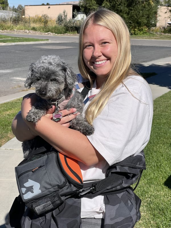 Away Home & Pet Care team member with a pet during a professional dog walking or pet sitting visit in Ogden, Utah