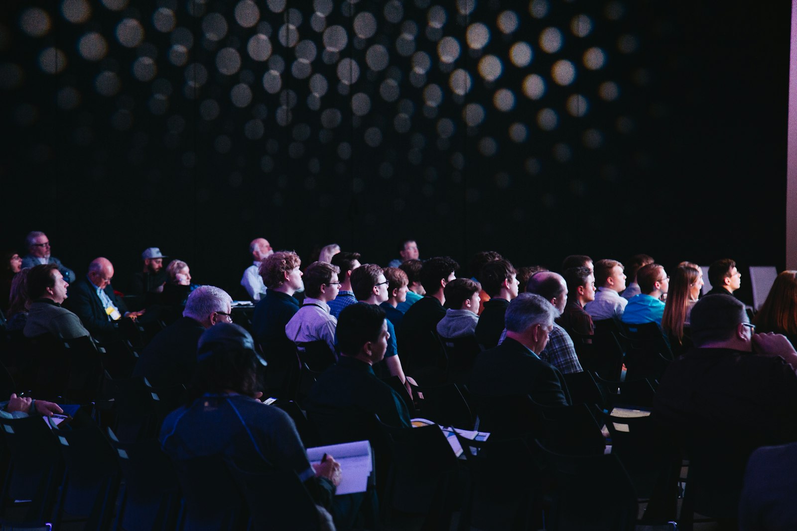 Premium corporate event stage with professional lighting
