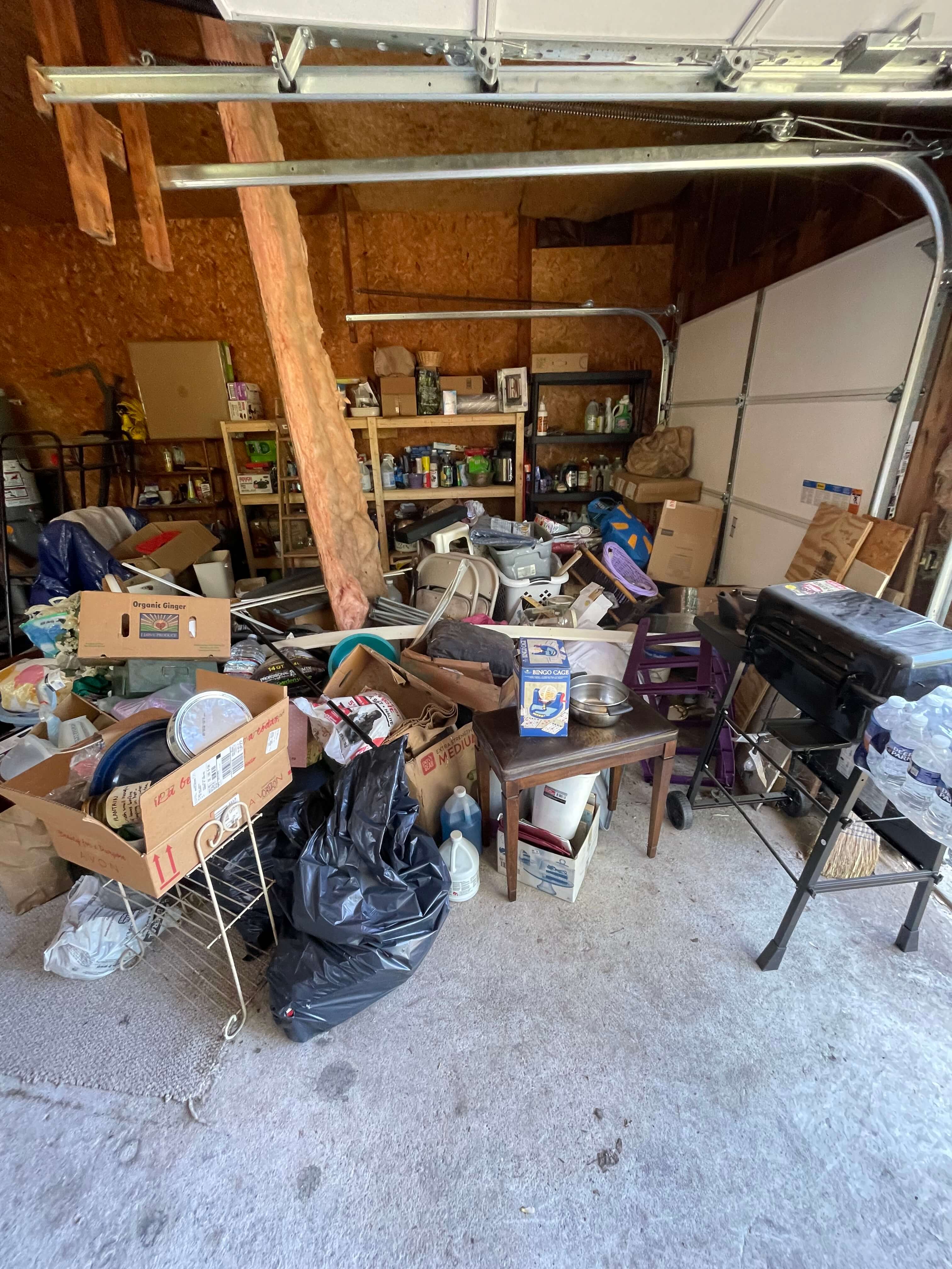 Flexible junk removal services - cluttered garage ready for cleanout