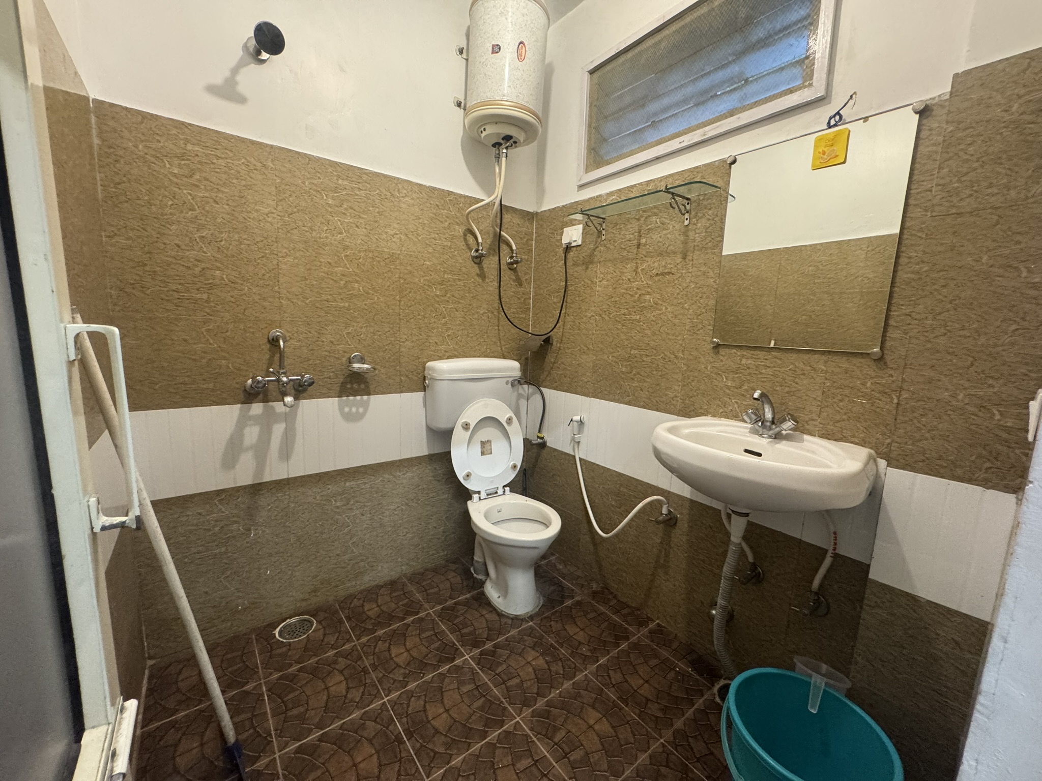 Elegant dark-themed living room with artwork.