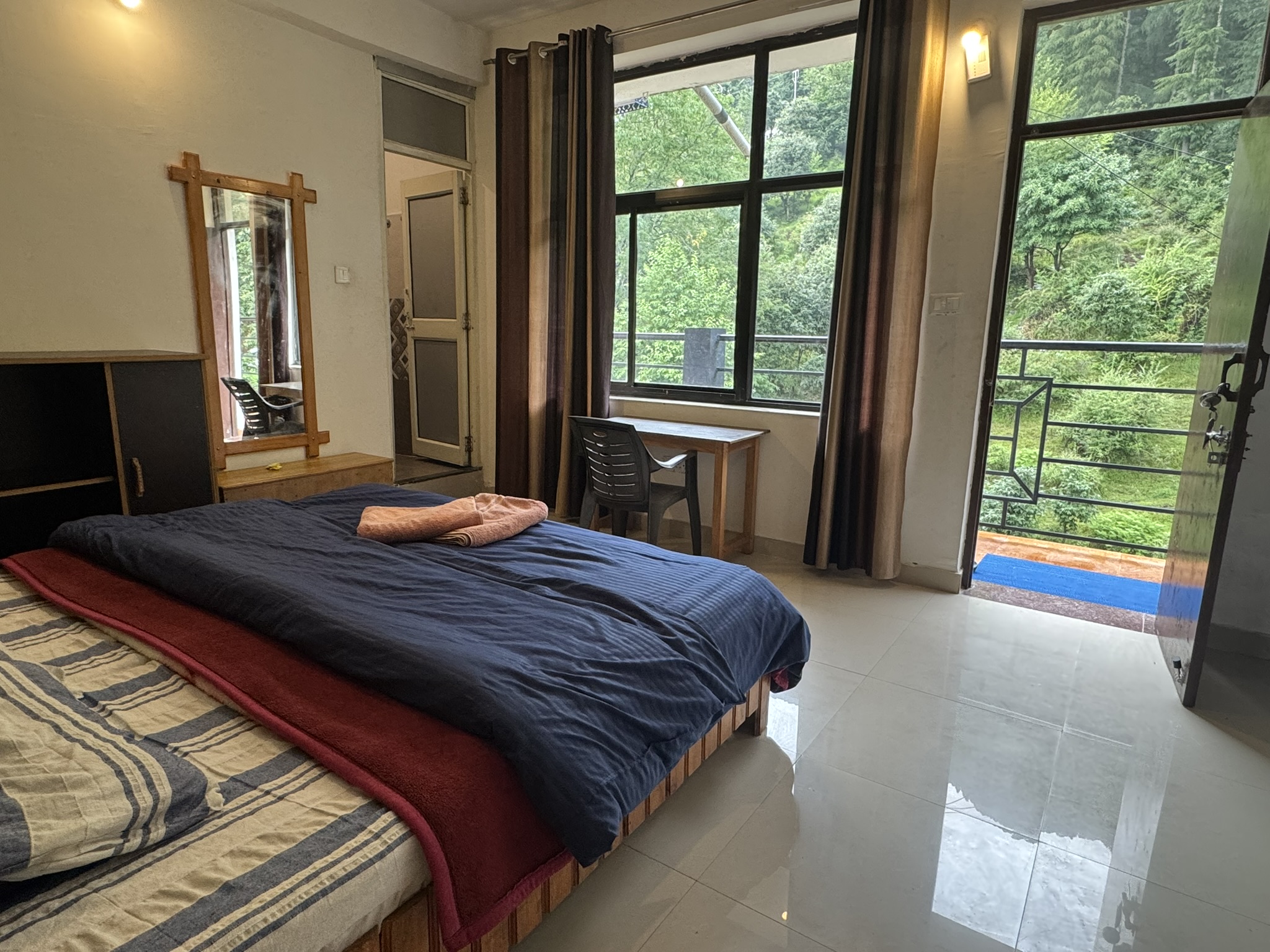 Spacious and luxurious hotel suite interior.