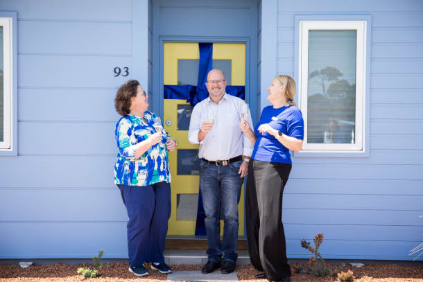 CELEBRATING OUR 100TH HOME WITH NEW HOMEOWNER