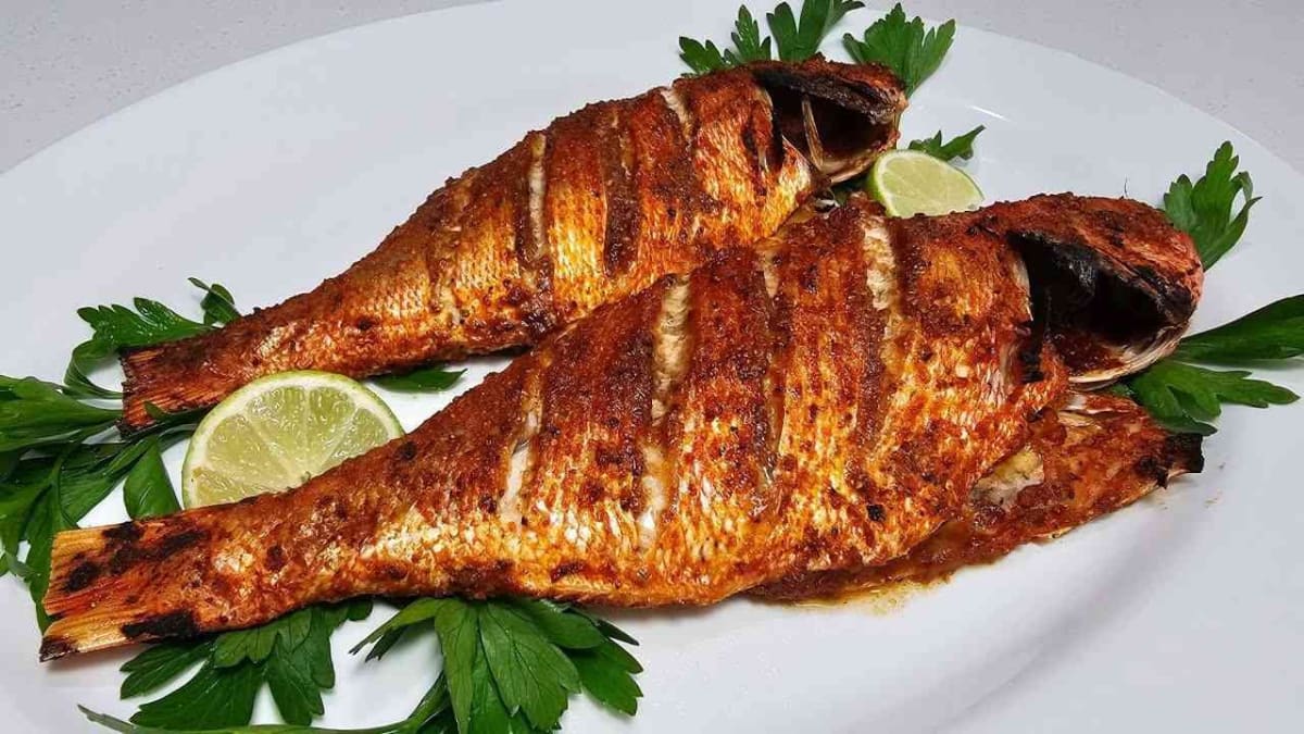 Mediterranean Baked Red Snapper with Fresh Herb & Olive Topping