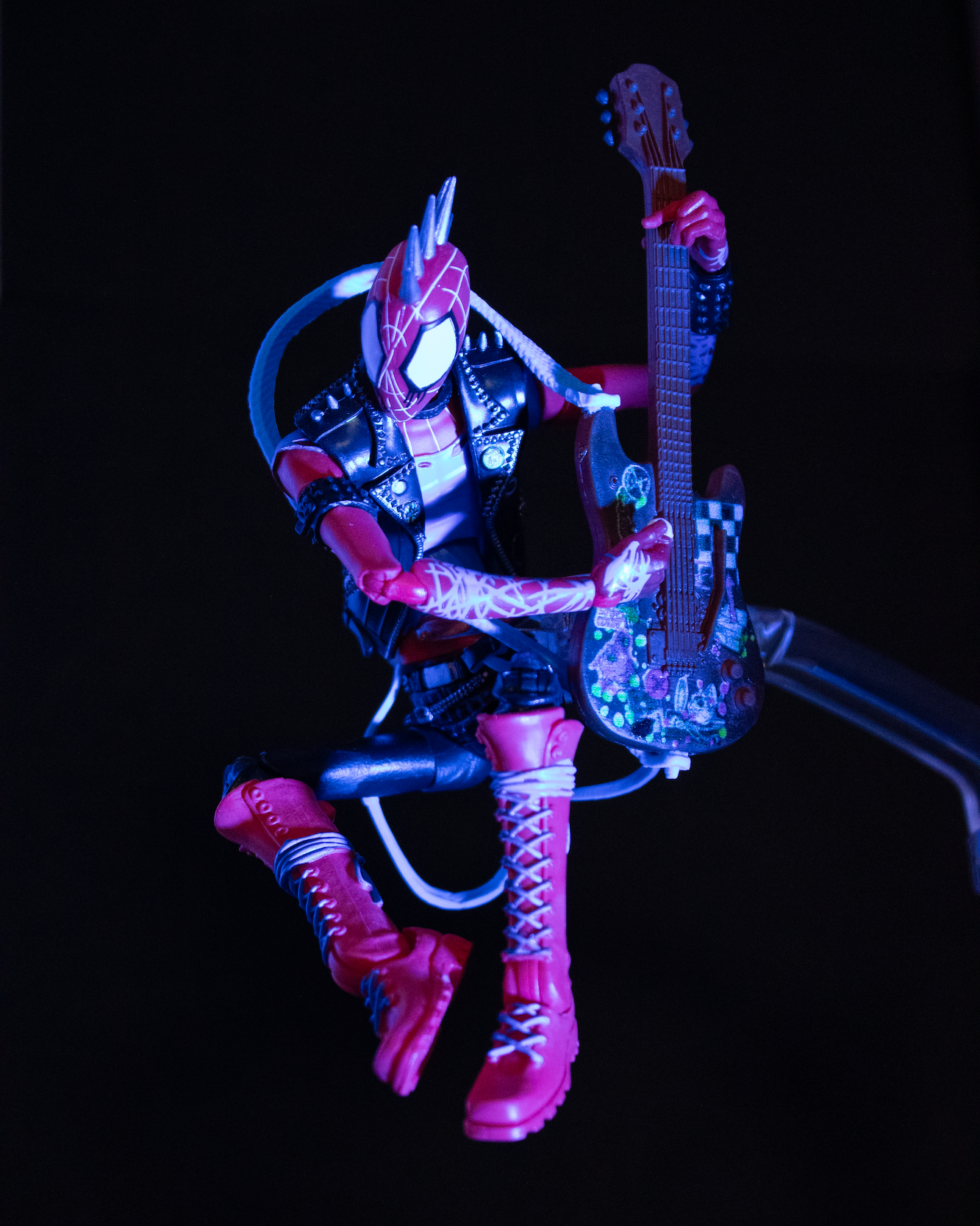 Spider-Punk jumping up in the air