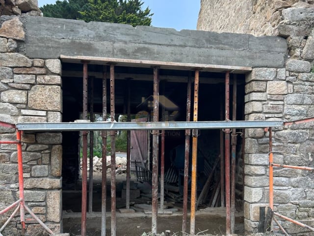 Création d'ouverture dans mur pierre ancien