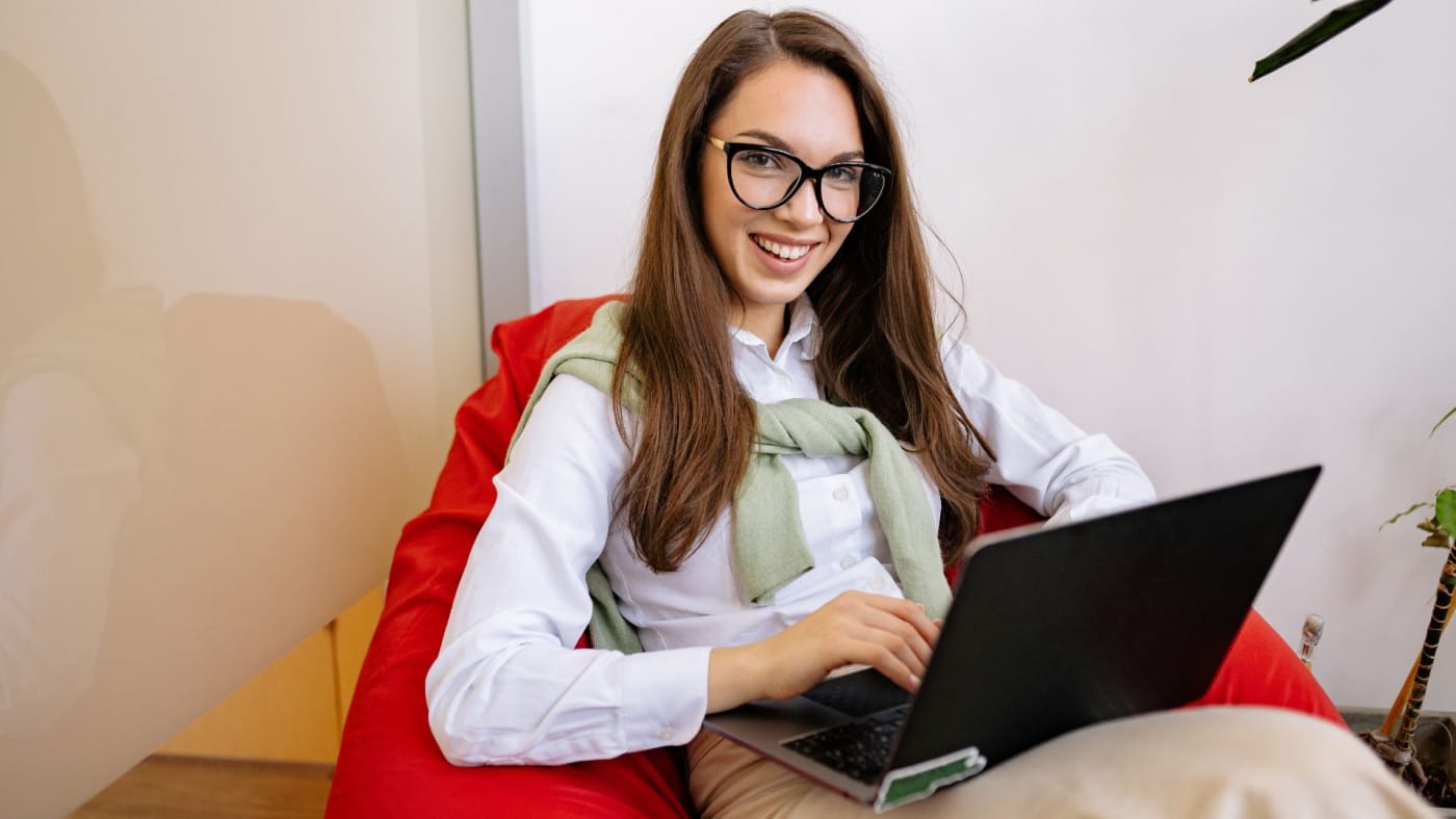 Small Irish business owner reviewing a digital marketing budget on a laptop
