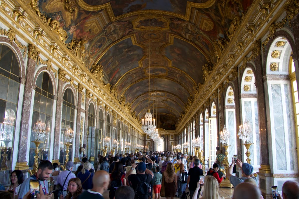 Ornate interior room at the Palace of Versailles