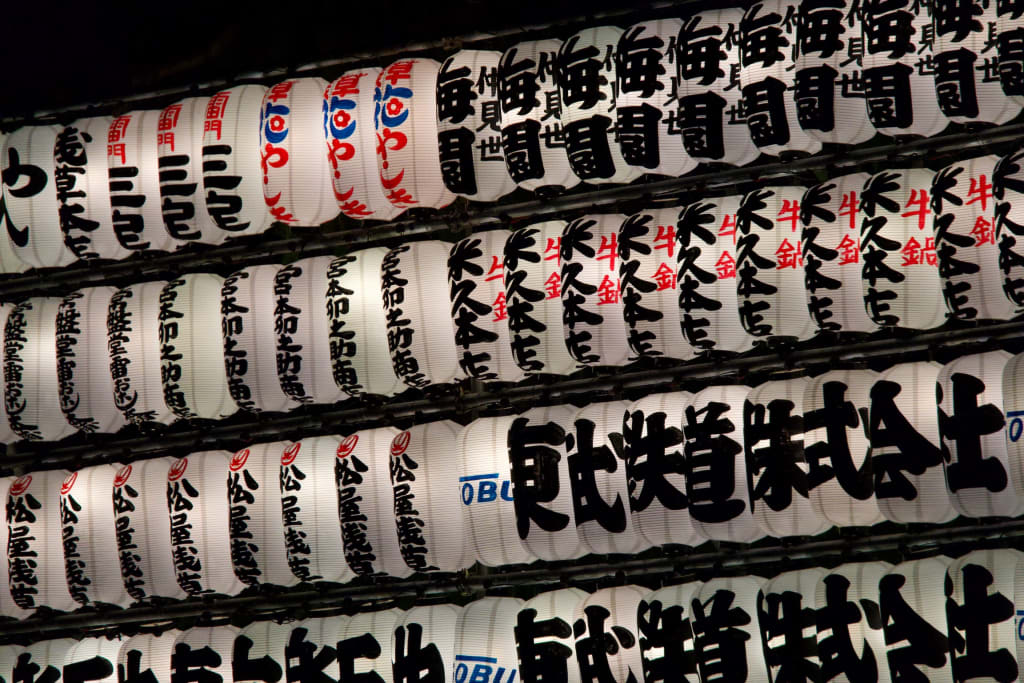 Lanterns and nighttime crowds at Senso-ji Temple