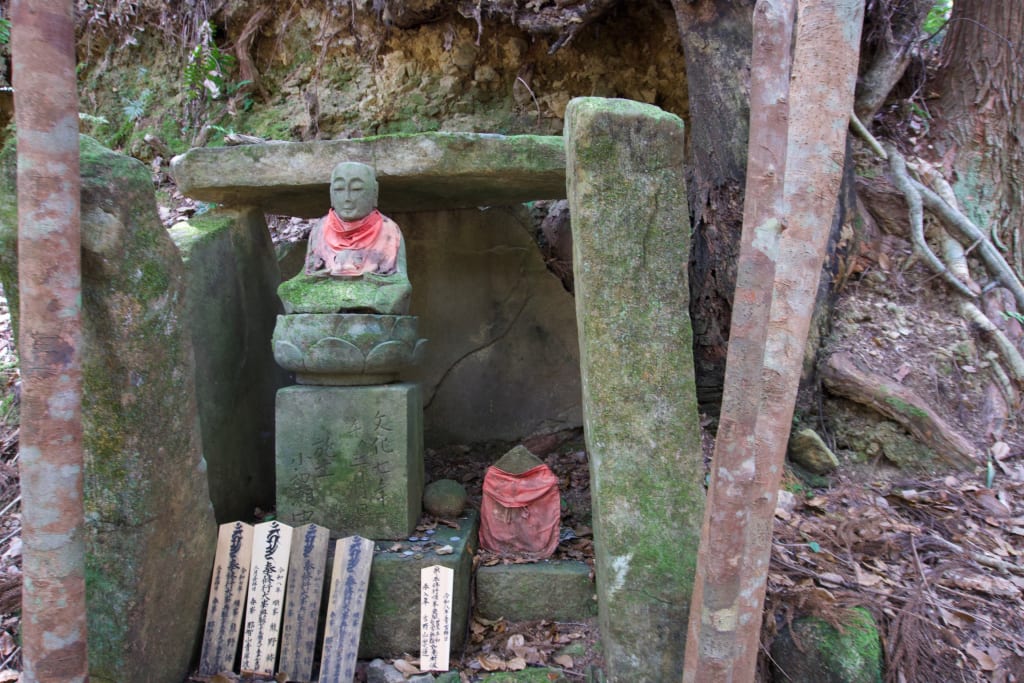 A small stone shrine along the Kumano Kodo trail