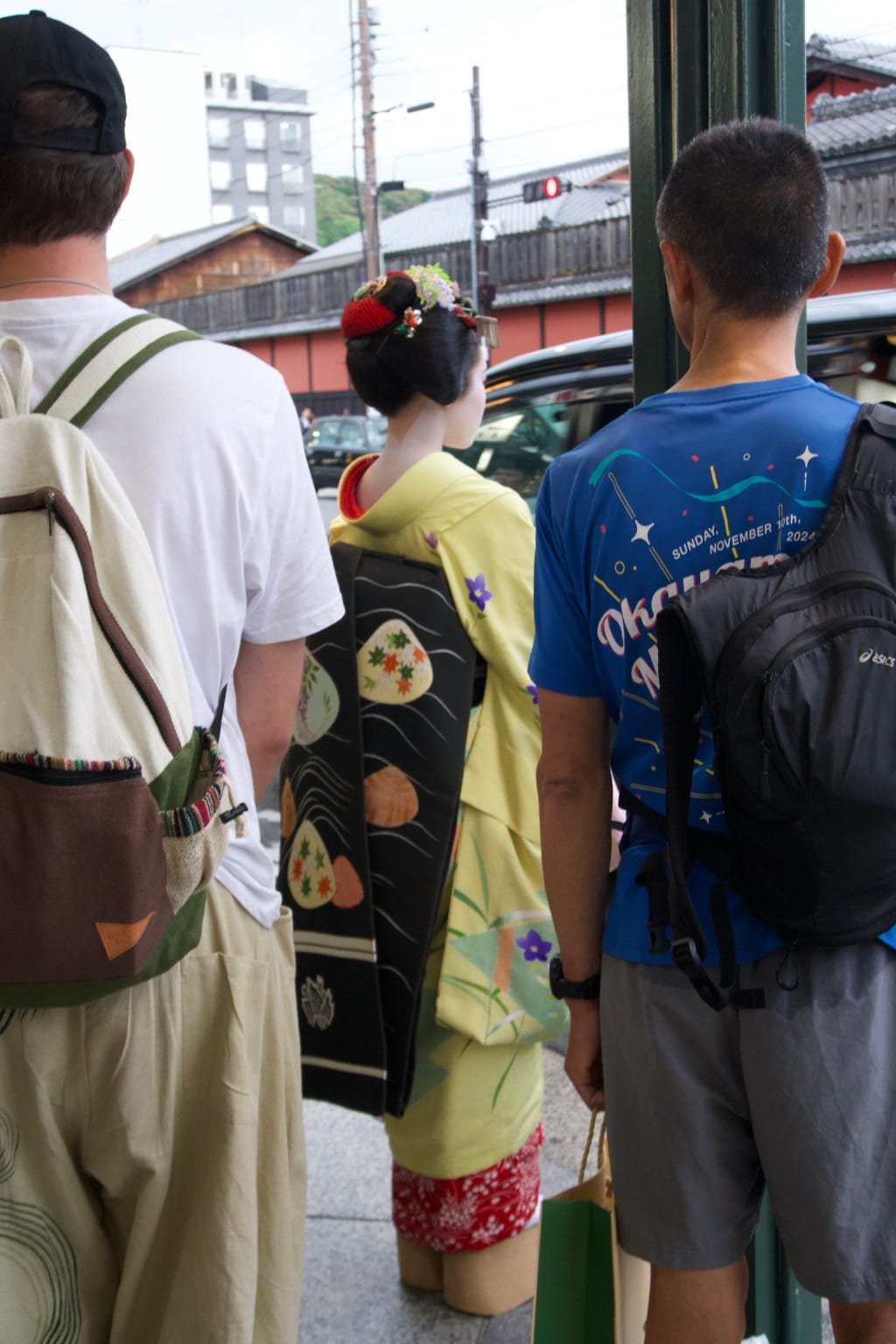 Geisha walking through Gion in Kyoto
