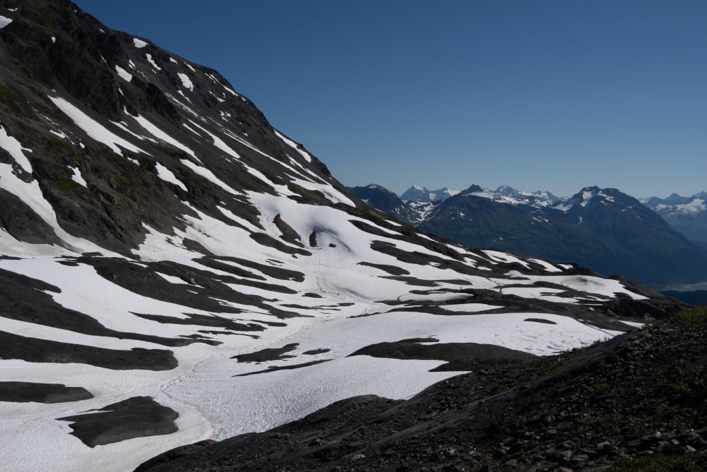 Snow-covered section of the Harding Icefield Trail in late July