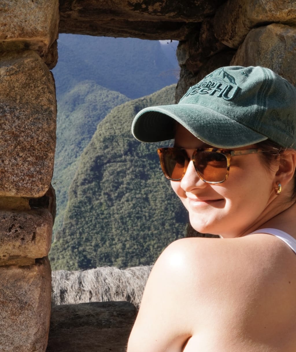Looking through a doorway in the Machu Picchu ruins