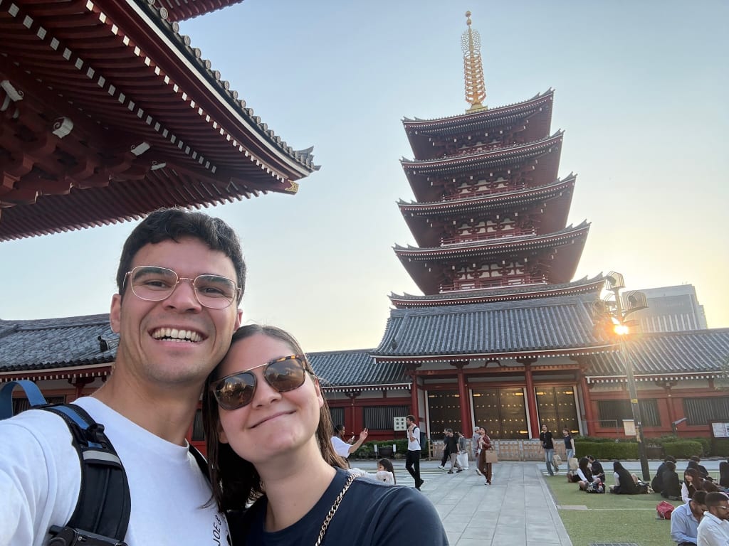 Visitors walking through Senso-ji in Asakusa