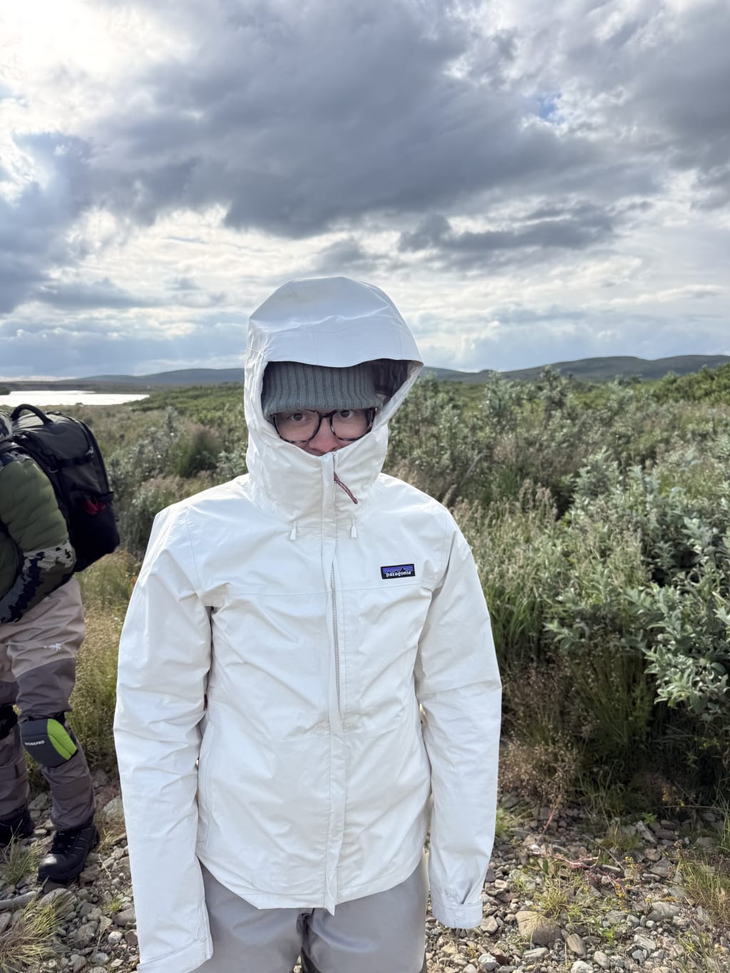 Kathryn wearing a rain jacket at Bear Camp