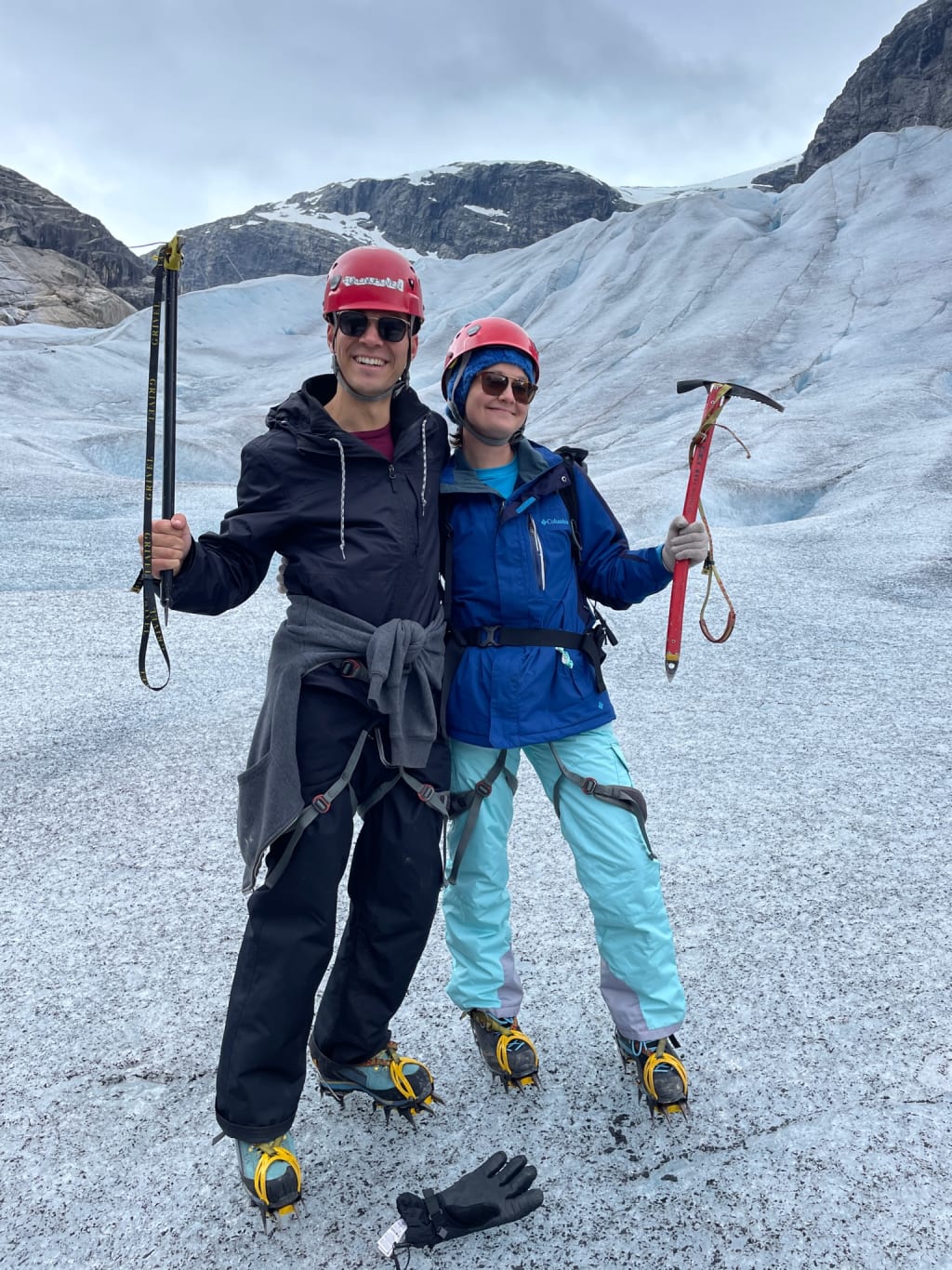 Wearing crampons and helmets before ice climbing on Jostedalsbreen Glacier