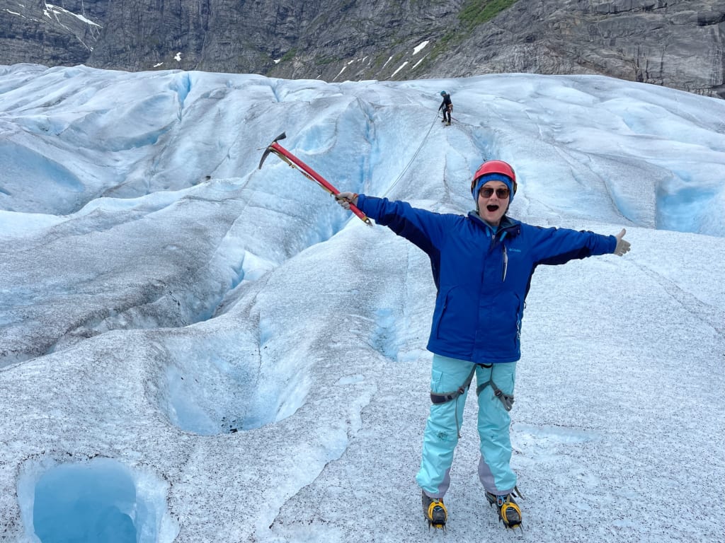Deep crevasse in the blue ice on Jostedalsbreen Glacier